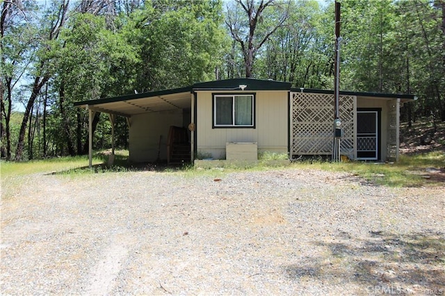 view of front of house featuring an attached carport