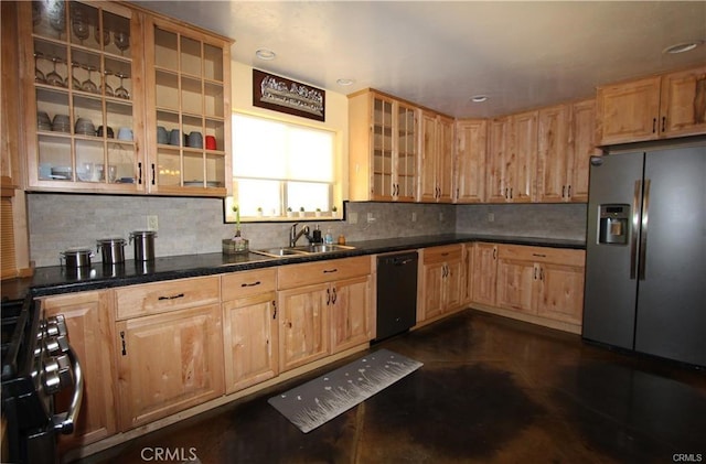 kitchen with tasteful backsplash, stainless steel fridge with ice dispenser, black dishwasher, gas stove, and a sink