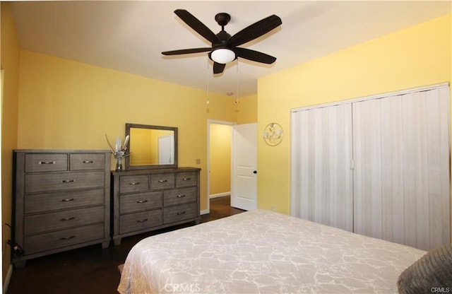 bedroom with dark wood-type flooring