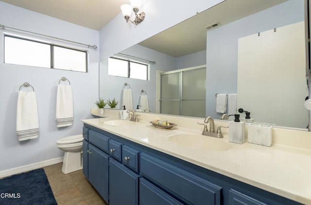 bathroom with visible vents, a stall shower, toilet, and a sink