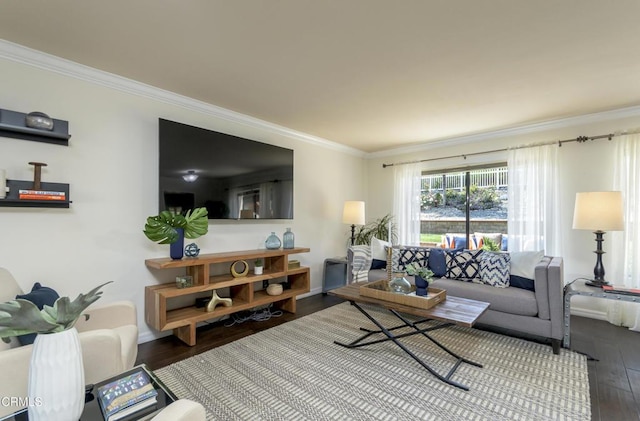 living area with crown molding and wood finished floors