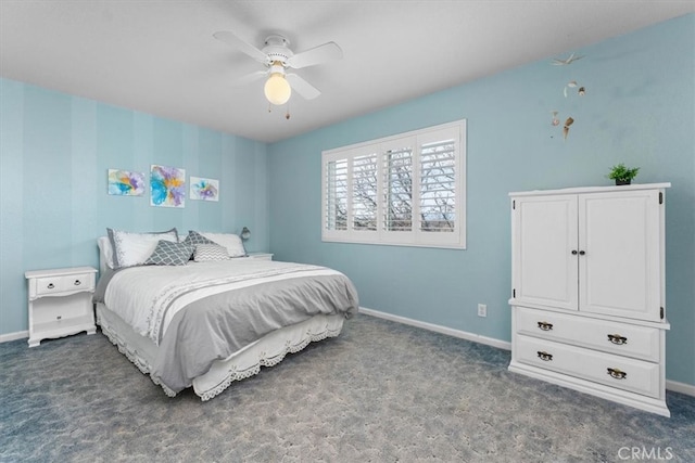 bedroom with a ceiling fan, carpet, and baseboards