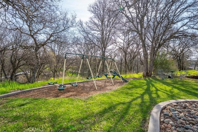 view of yard featuring playground community