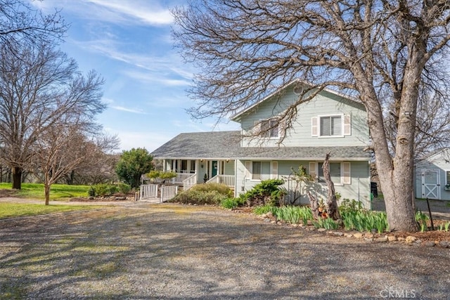 view of front of property featuring covered porch