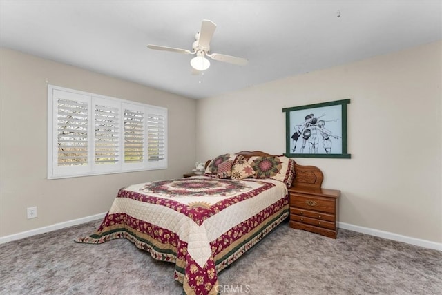 carpeted bedroom featuring ceiling fan and baseboards