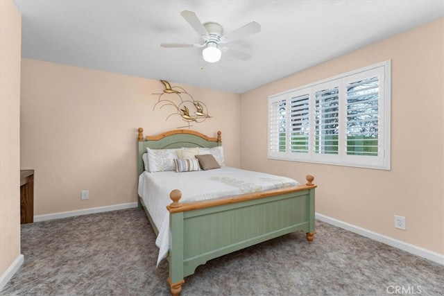 bedroom with carpet and baseboards