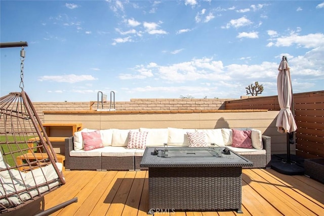 wooden deck featuring an outdoor living space