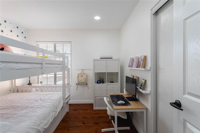 bedroom with recessed lighting, baseboards, and dark wood finished floors