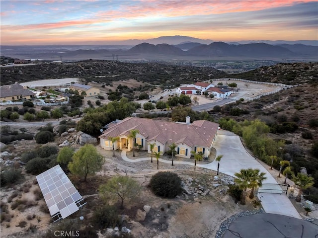 aerial view at dusk with a mountain view