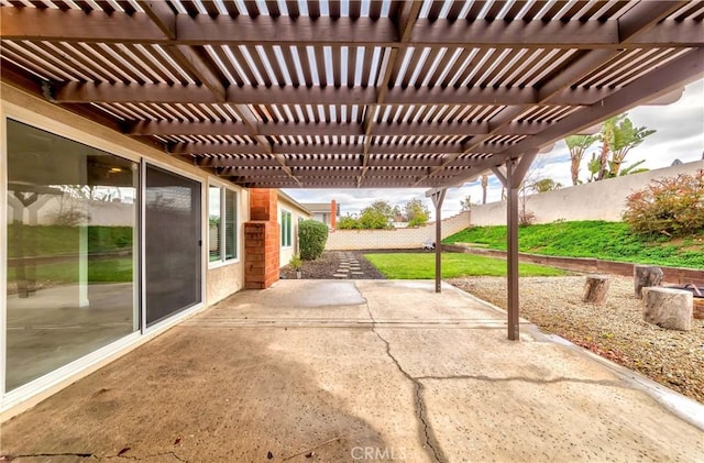 view of patio / terrace featuring fence