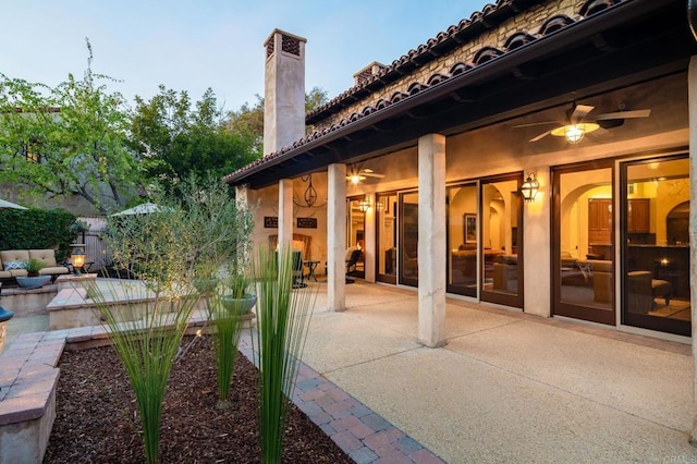 view of patio / terrace with a ceiling fan