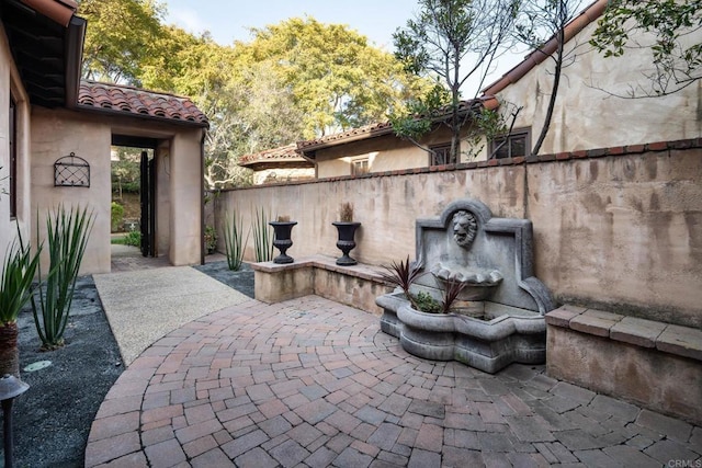 view of patio with fence