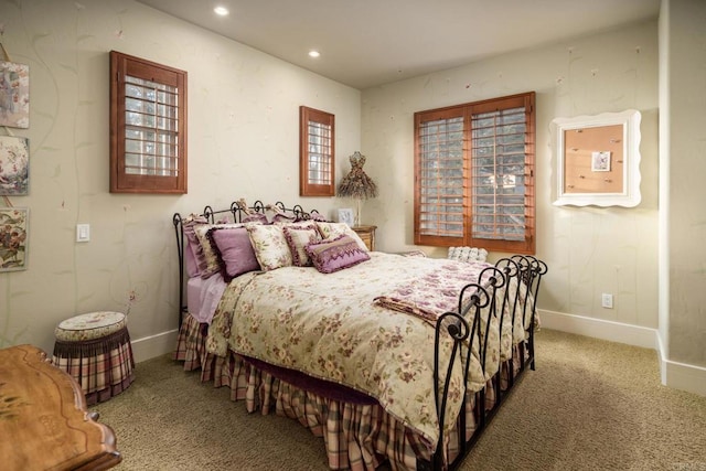 bedroom featuring recessed lighting, baseboards, and carpet