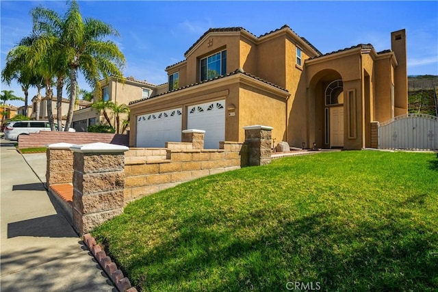 mediterranean / spanish-style house with stucco siding, a tile roof, a gate, a front yard, and an attached garage