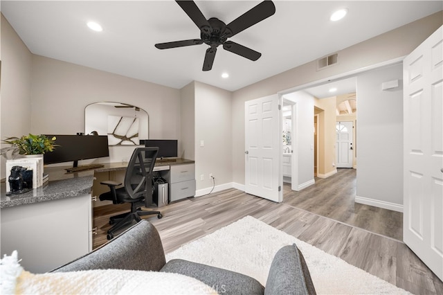 office area with visible vents, a ceiling fan, wood finished floors, recessed lighting, and baseboards