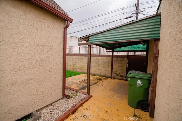 view of patio / terrace with fence