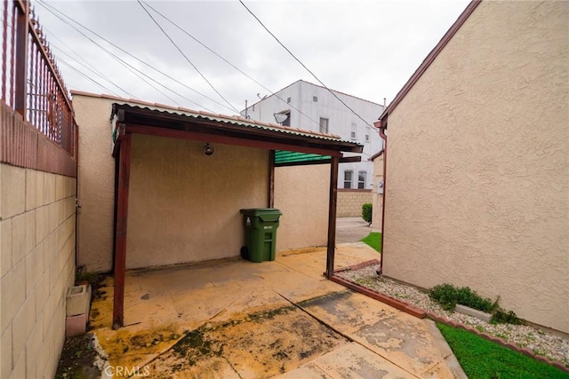 view of patio / terrace featuring fence