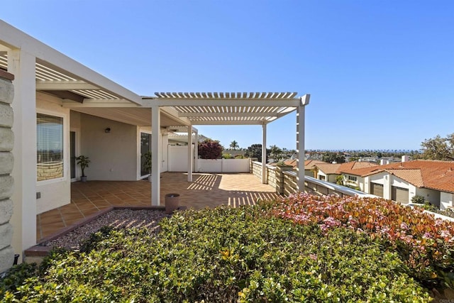 view of patio with fence and a pergola