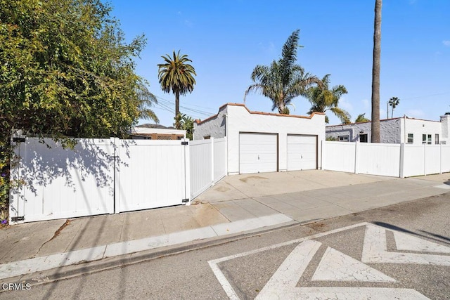 garage with fence