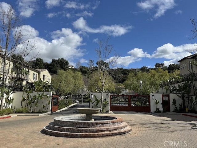 surrounding community featuring a gate