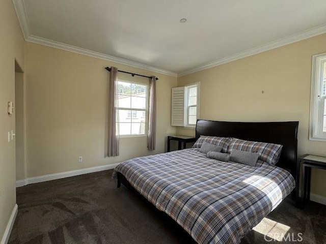 bedroom featuring crown molding, carpet, and baseboards