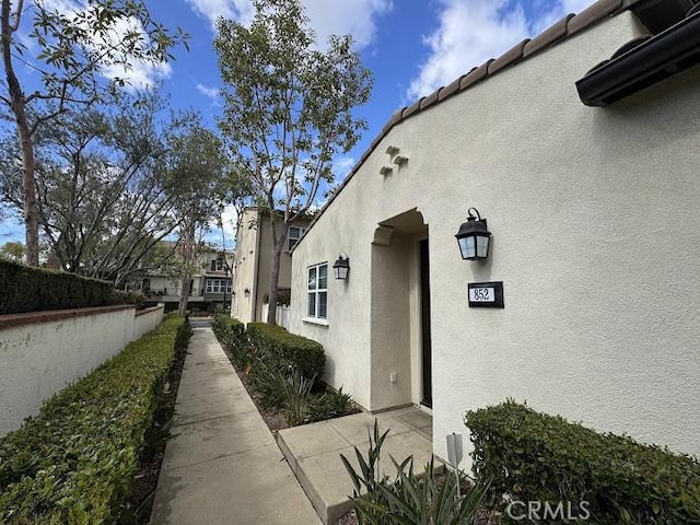 view of home's exterior with stucco siding