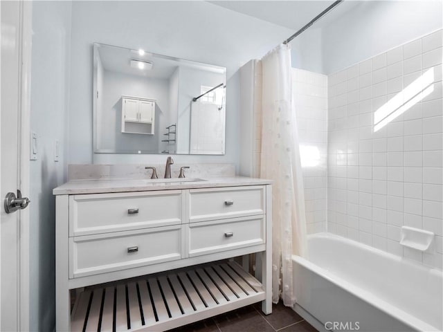 bathroom with tile patterned flooring, vanity, and shower / bathtub combination with curtain