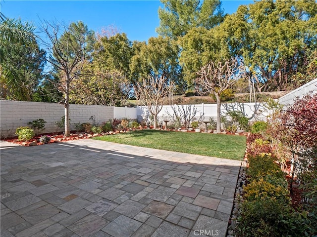 view of patio with a fenced backyard