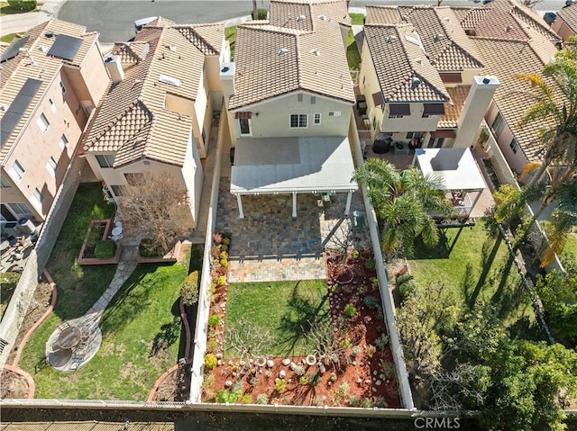 birds eye view of property with a residential view