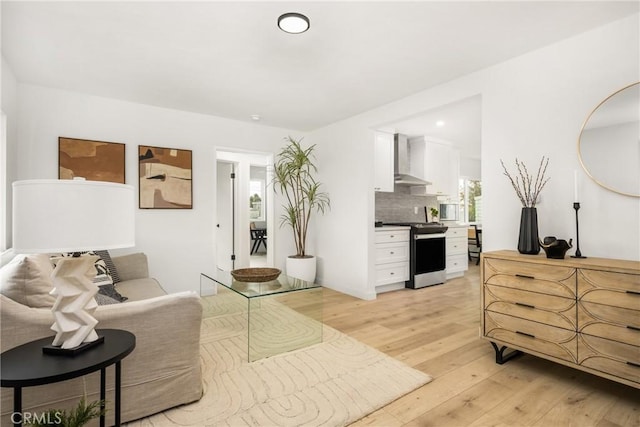 living area with light wood-style floors