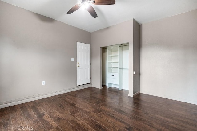 unfurnished bedroom with a closet, baseboards, a ceiling fan, and wood finished floors