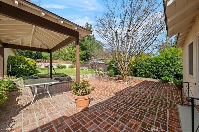 view of patio / terrace featuring a gazebo and a fenced backyard