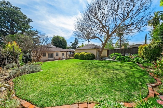 view of yard featuring fence