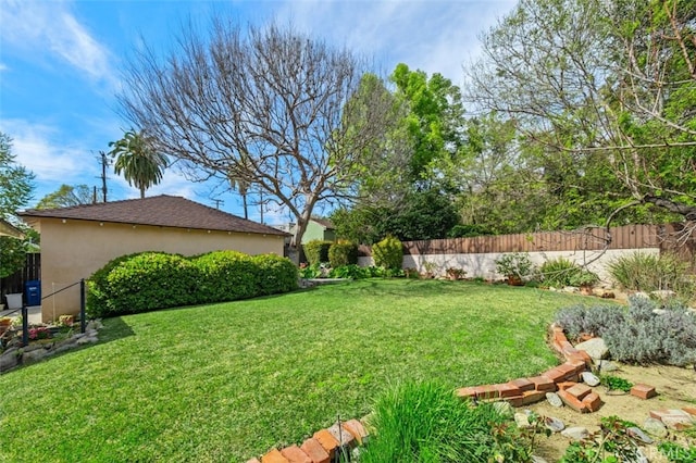 view of yard with fence