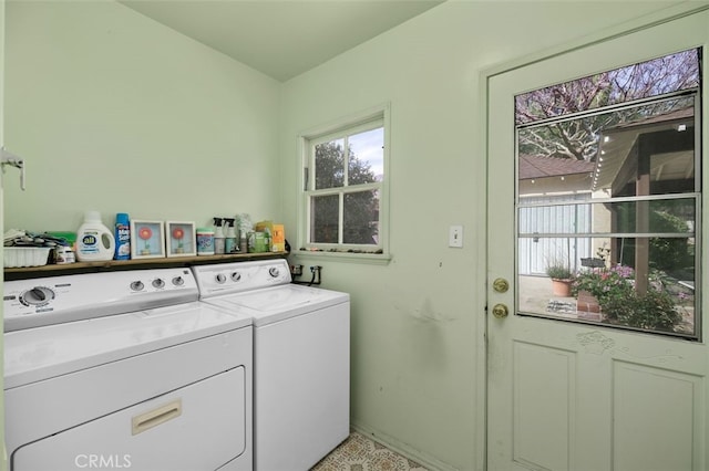 laundry area featuring laundry area and washer and clothes dryer