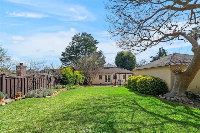 view of yard with fence