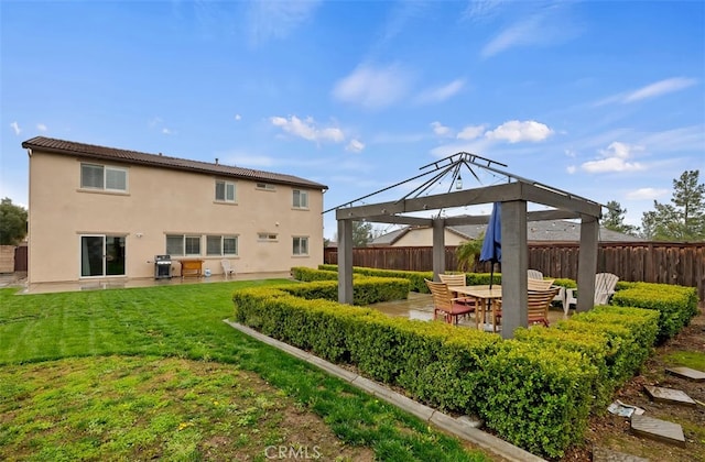 exterior space with a gazebo, stucco siding, fence, and a patio