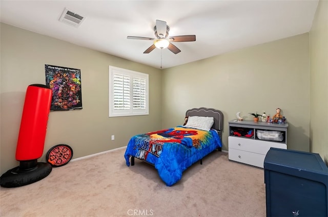 bedroom featuring visible vents, carpet floors, baseboards, and a ceiling fan