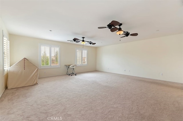 empty room with light colored carpet