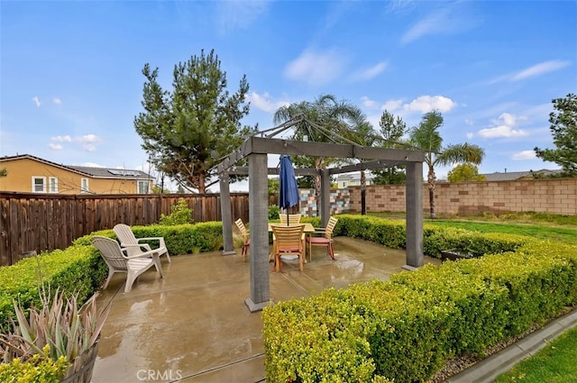 view of patio / terrace featuring a gazebo and a fenced backyard