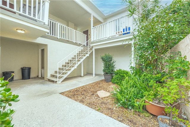 exterior space featuring stucco siding