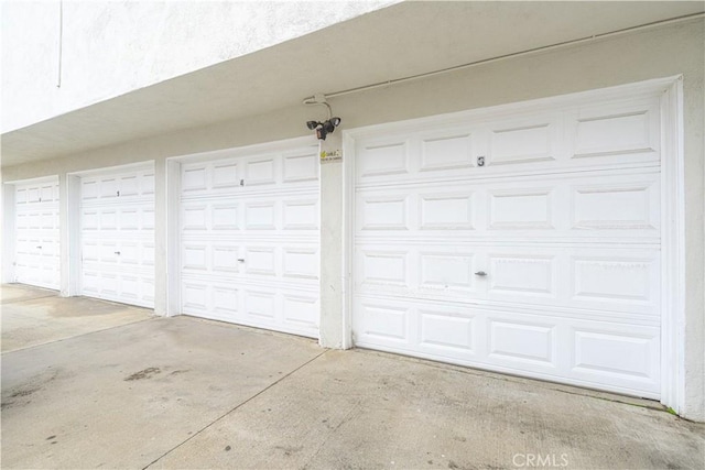 garage with driveway