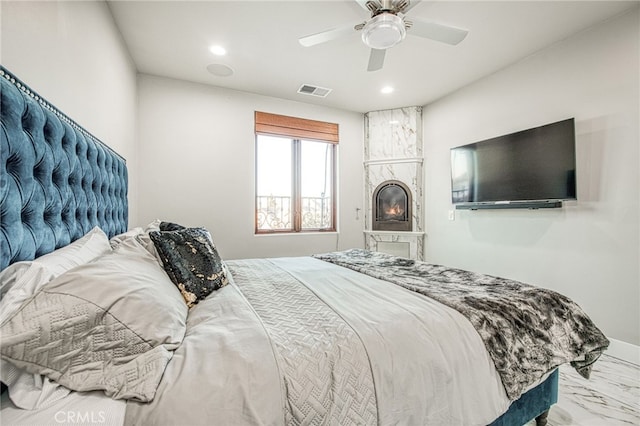 bedroom featuring recessed lighting, visible vents, marble finish floor, and a ceiling fan