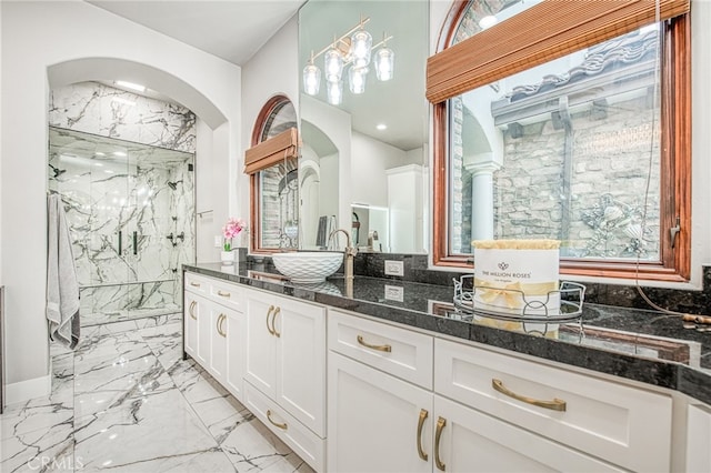 full bath with vanity, recessed lighting, marble finish floor, and a marble finish shower