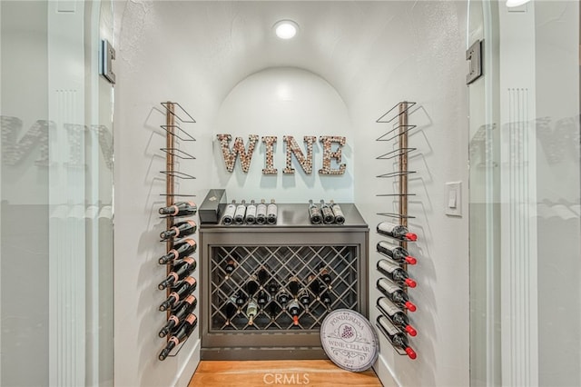 wine cellar with wood finished floors