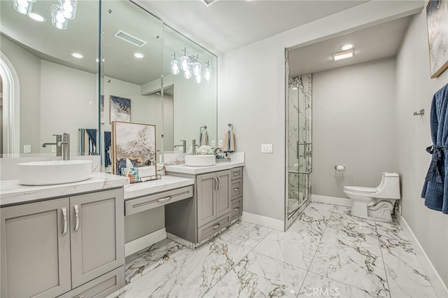 bathroom with visible vents, a shower stall, baseboards, toilet, and a sink