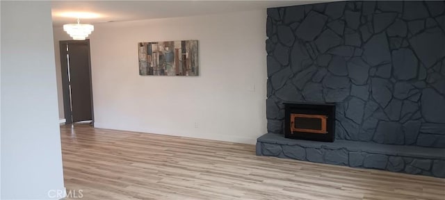 unfurnished living room with wood finished floors