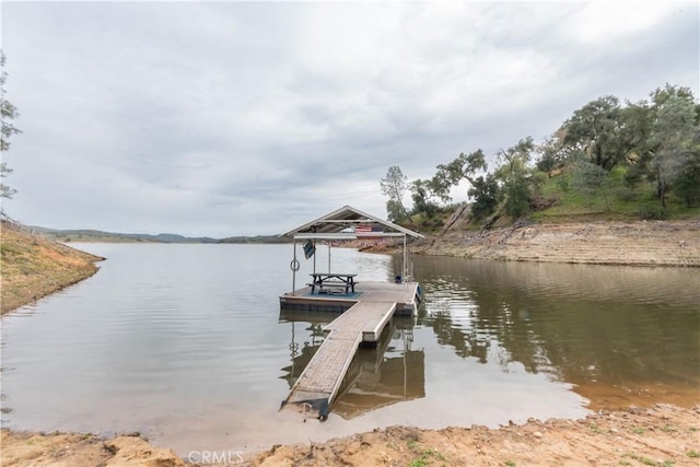 view of dock with a water view