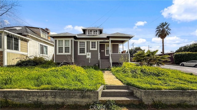 bungalow-style home with covered porch