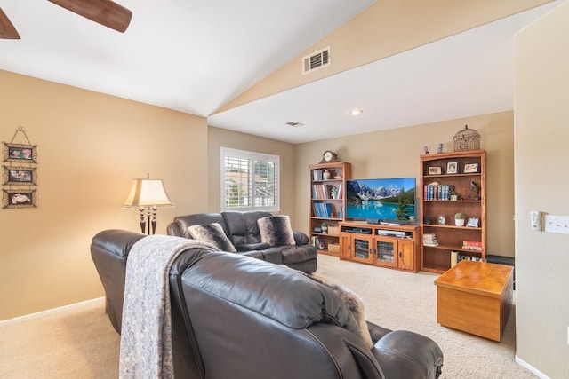 living room featuring carpet, baseboards, visible vents, lofted ceiling, and ceiling fan